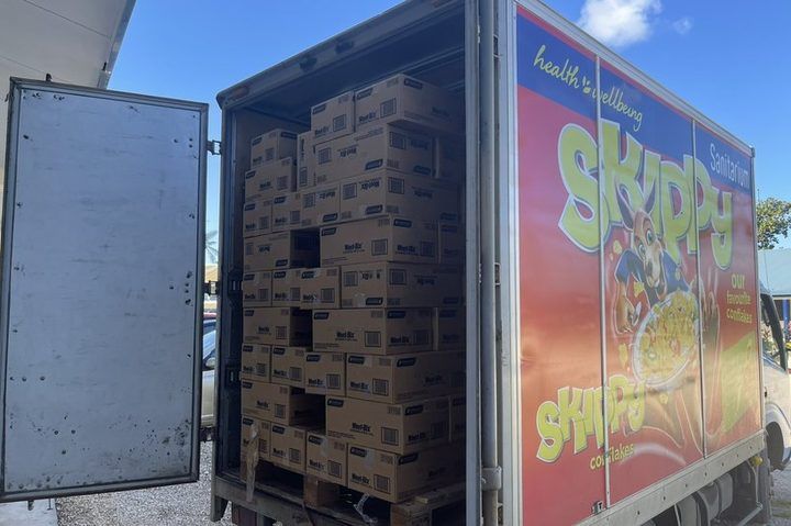 A delivery truck loaded with pallets of Weet-Bix catering packs for the school breakfast donation.