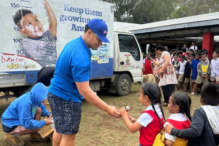 Milk handed to students from the ACS delivery truck.