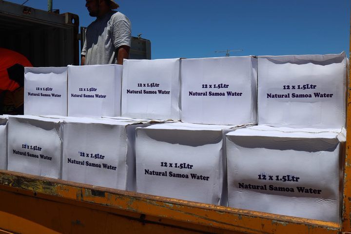 Cartons of 12 x 1.5 litre Natural Samoa Water stacked on the truck tray.