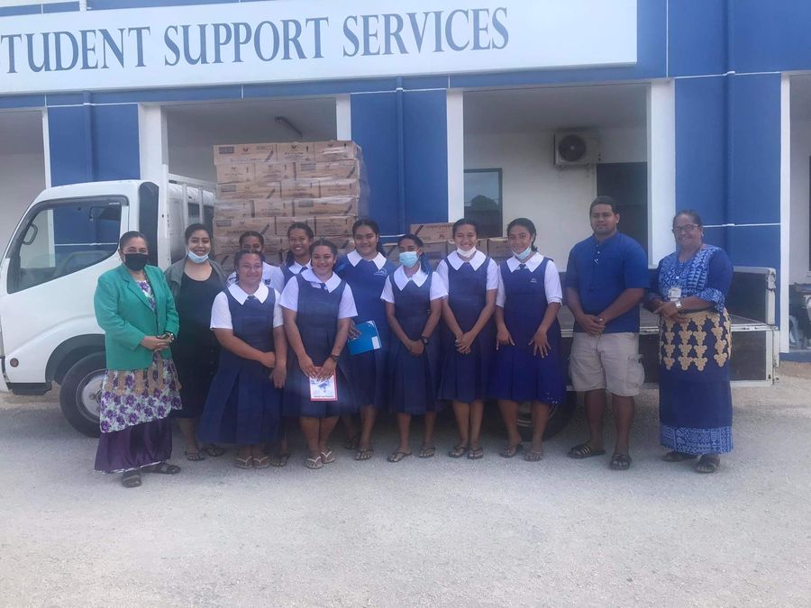 Students and staff with the delivery of breakfast crackers outside Student Support Services.