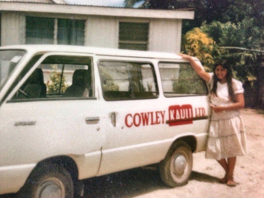 A white delivery van lettered Cowley Kauii Ltd in red.