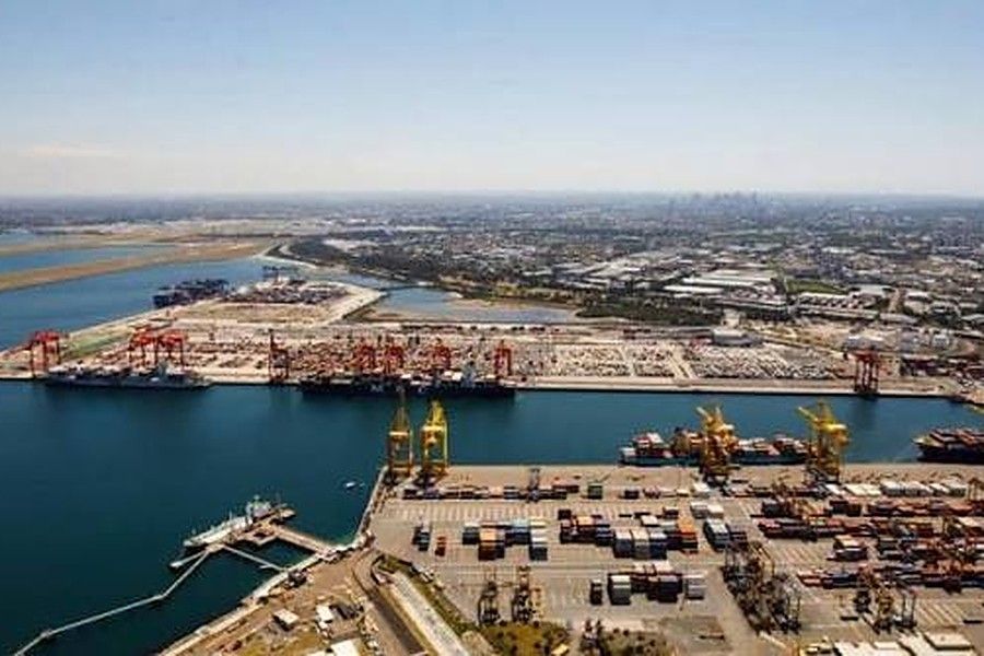 Aerial view of Port Botany, Sydney, with container terminals, gantry cranes and vessels alongside.